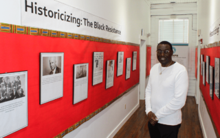 Charles Barnes at Black History Month Exhibit Historicizing the Black Resistance